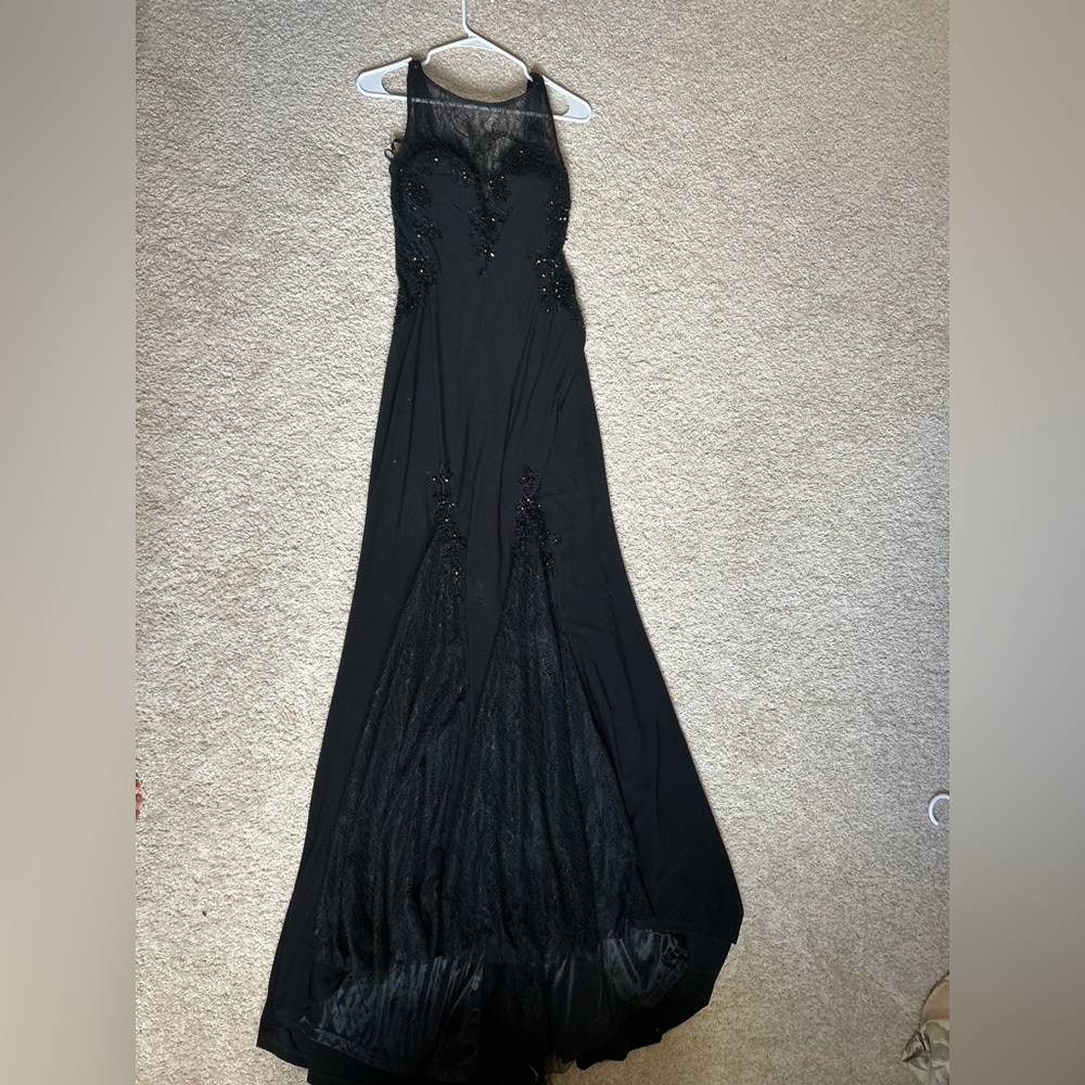 Beautiful black, sparkly/lacey formal dress. Size 10 but fits more like a 6/8.